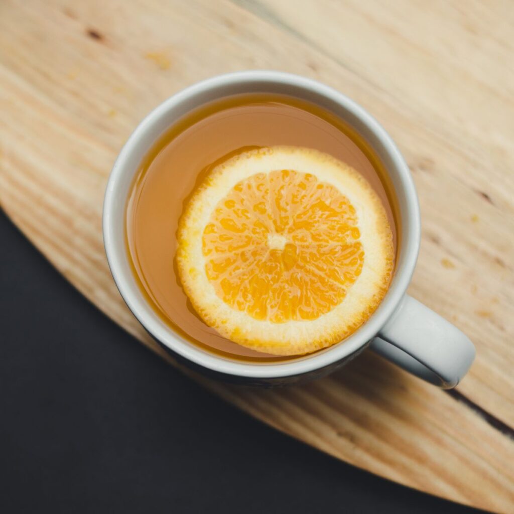 A mug of Russian Tea with an orange slice floating