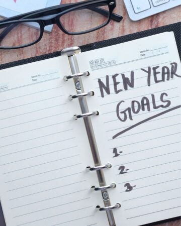 Goals list in planner on desk
