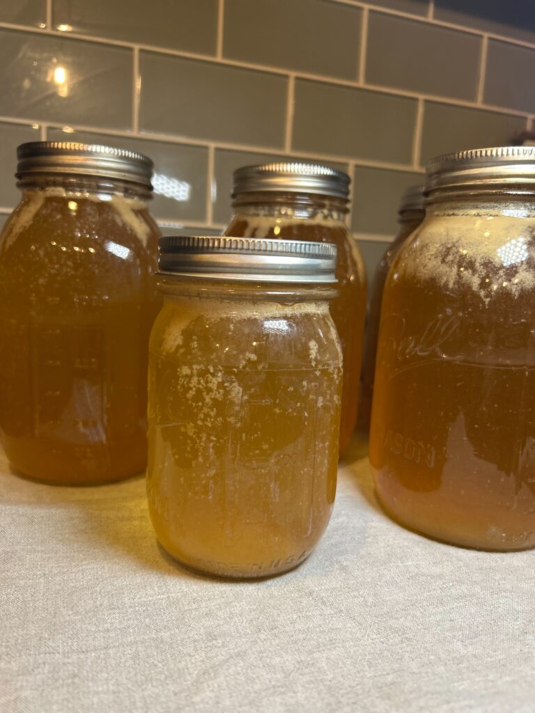 Canned broth on counter cooling